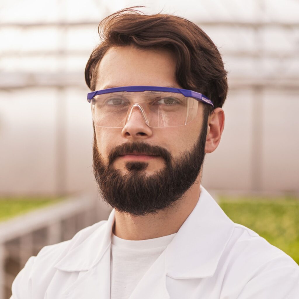 scientist in uniform in modern greenhouse dd7x7km.jpg